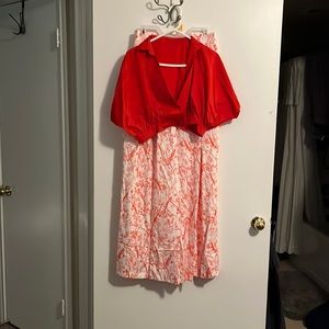 Red crop top with wide leg trousers